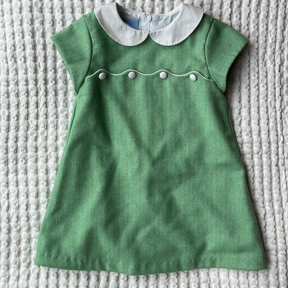 Bella Bliss dress. Short sleeve green with Peter Pan collar and button details.